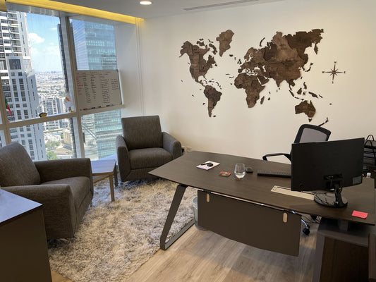 A 3D Wooden World Map in Oak Color in an Office