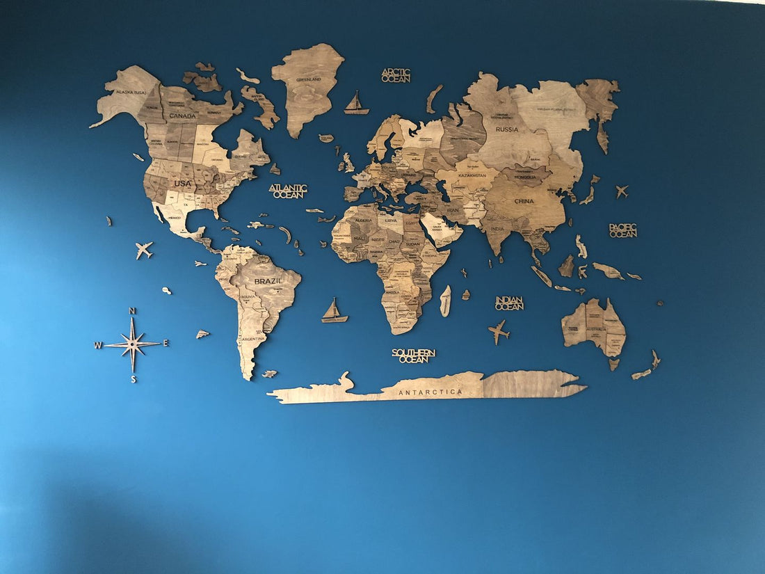 3D Wooden World Map in Terra Color on a Blue Wall