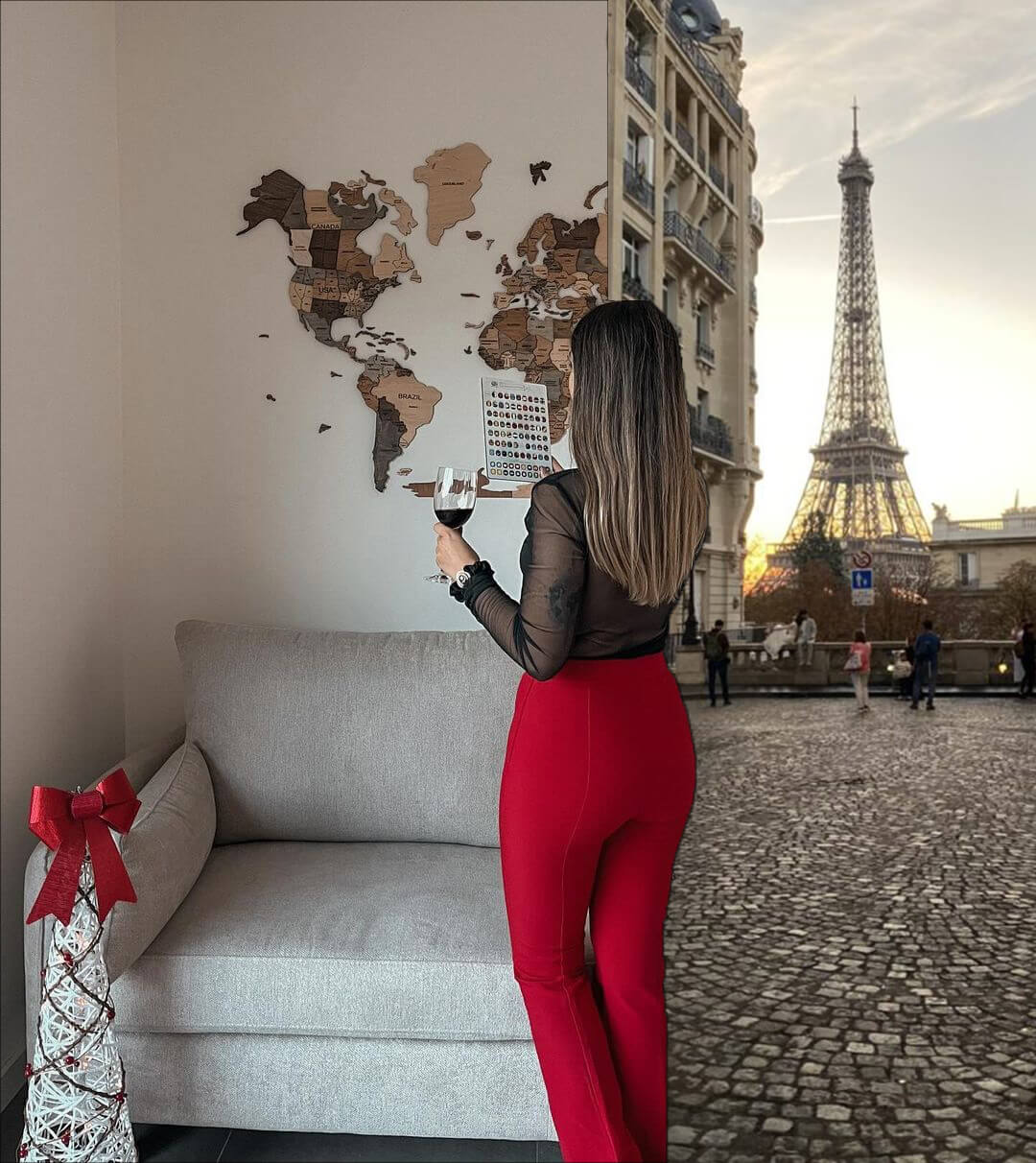 3D Wooden World Map in Multiclor Woman standing in front 