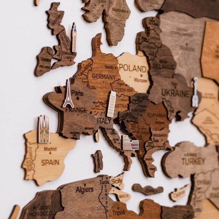 wooden world map with pins