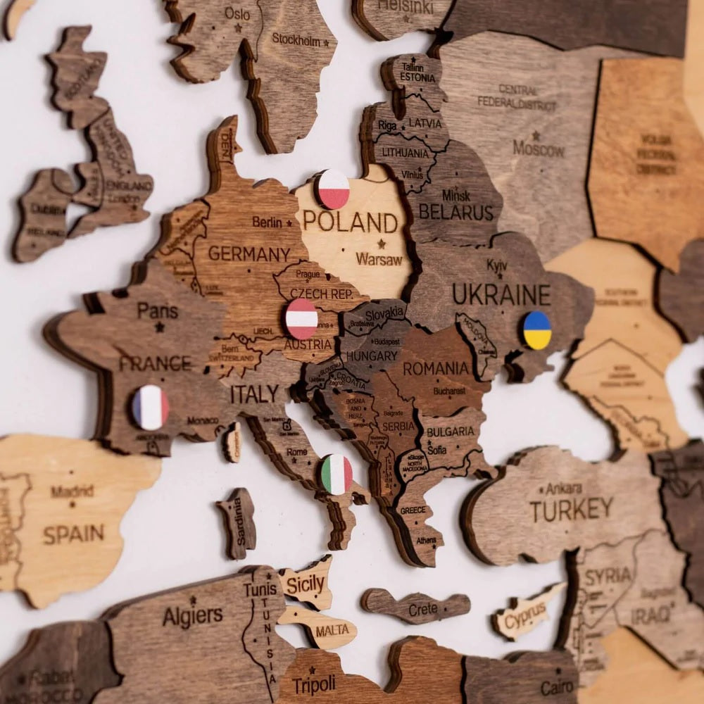 Europe Flag Pin on a Wooden World Map